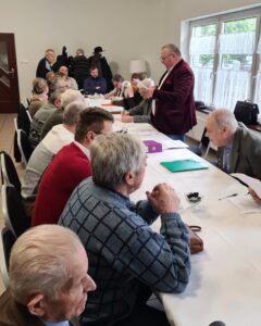 odczytanie sprawozdania przez Prezesa Sławomira Studzińskiego